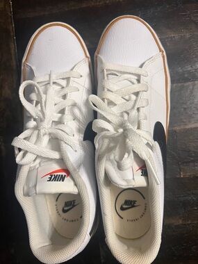Nike White Leather Sneakers with Black Swoosh and Gum-Trim Sole